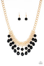 Load image into Gallery viewer, imperfect black beads dangle from a web of interlocking gold links below the collar