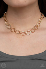 Load image into Gallery viewer, Imperfectly shaped gold circles link together around the neck for a gritty industrial statement.